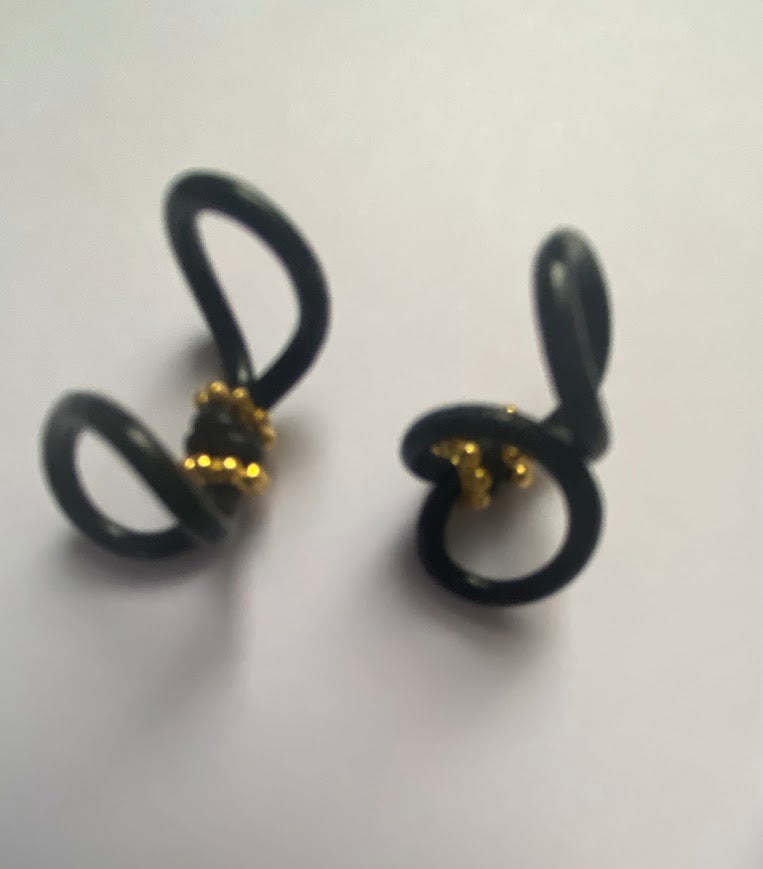 Support implant cochleaire pour lunettes
