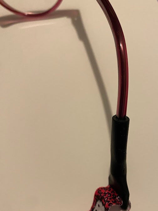 Cordon ajustable pour maintenir les lunettes des enfants