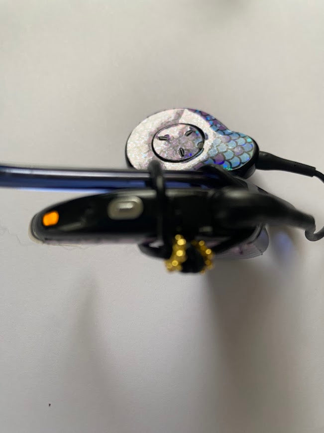 Support implant cochleaire pour lunettes