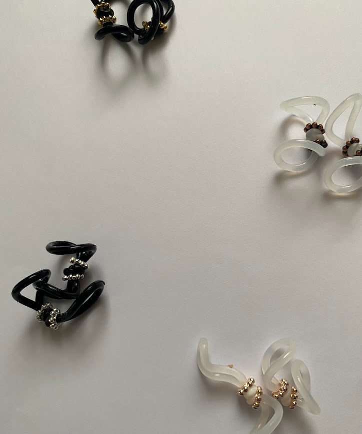 Support implant cochleaire pour lunettes