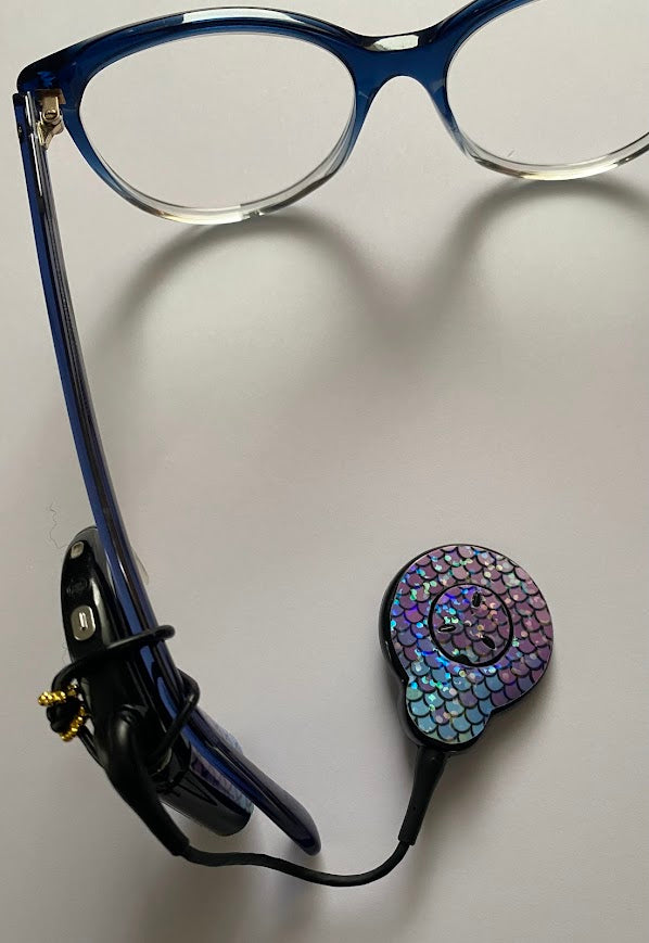 Support implant cochleaire pour lunettes