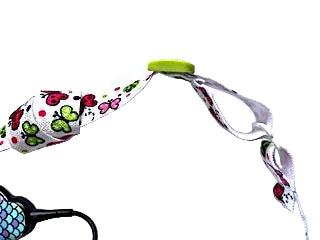Bandeau ajustable pour le maintien des implants cochleaires et aides auditives