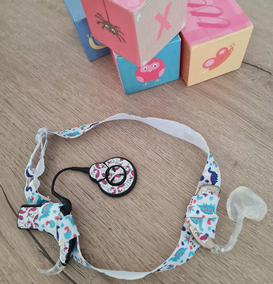 Bandeau ajustable  pour implant cochléaire et prothèses pour enfants et bébés motif Dino