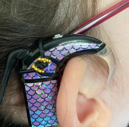 Support pour implant cochleaire et prothèse auditive a fixer sur les lunettes