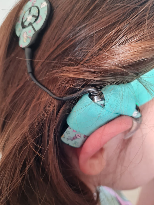 Bandeau large réglable pour implant cochléaire et prothèse auditive