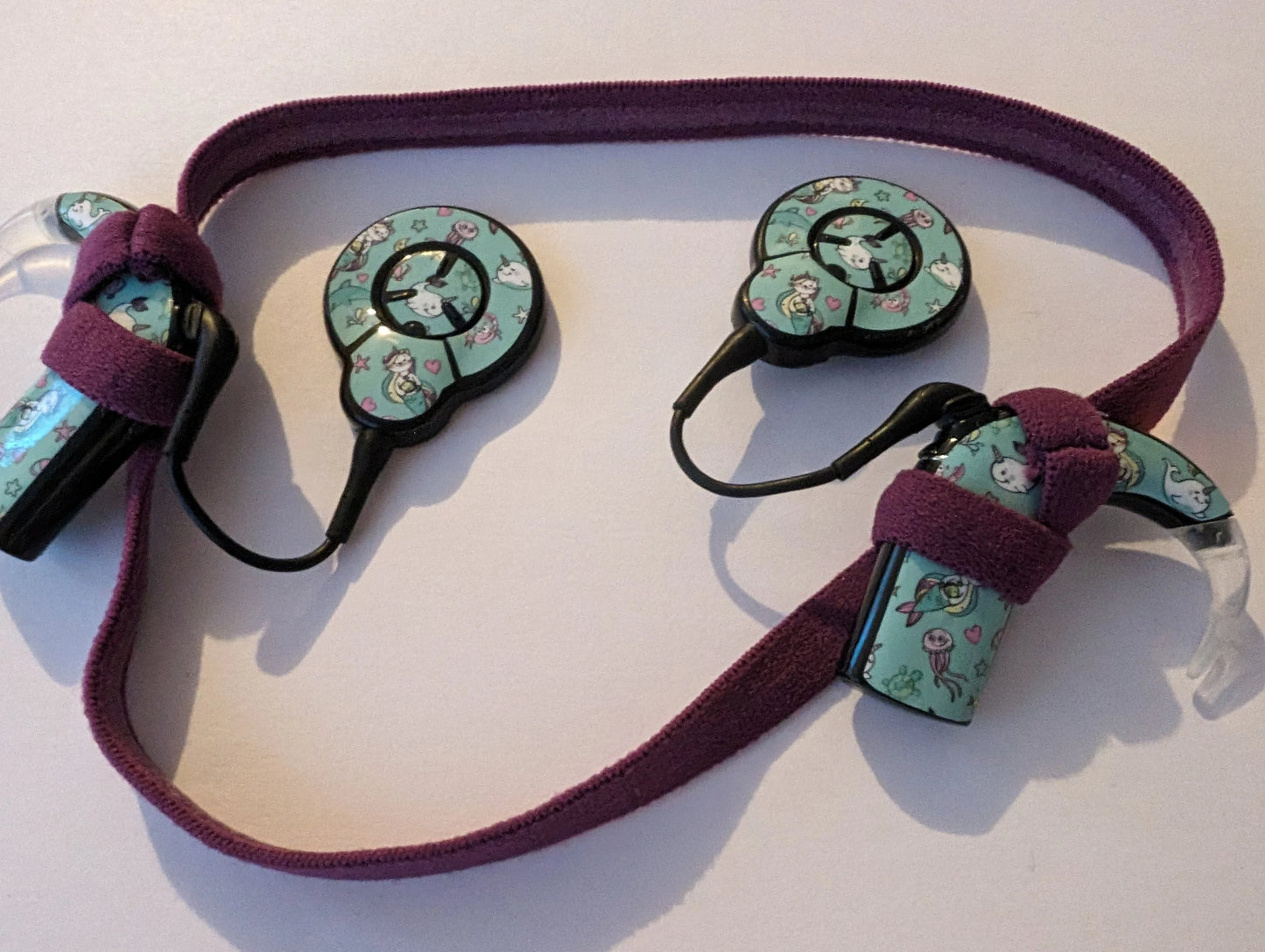 Bandeau sport antidérapant pour implant cochleaire et prothese auditive