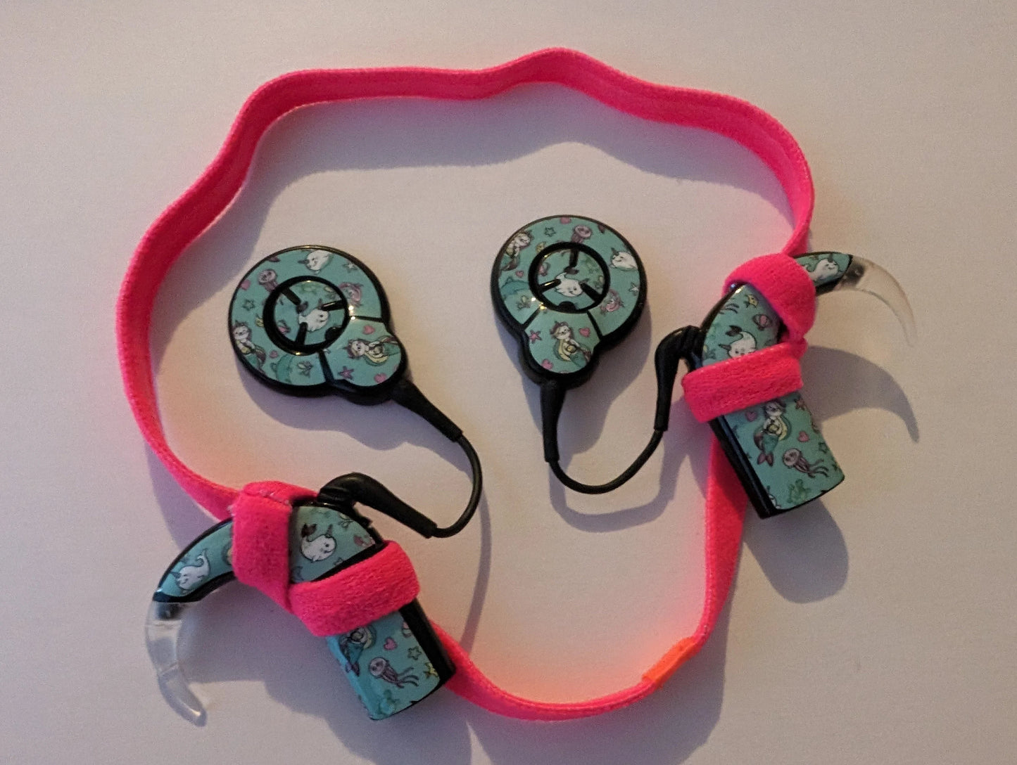 Bandeau sport antidérapant pour implant cochleaire et prothese auditive