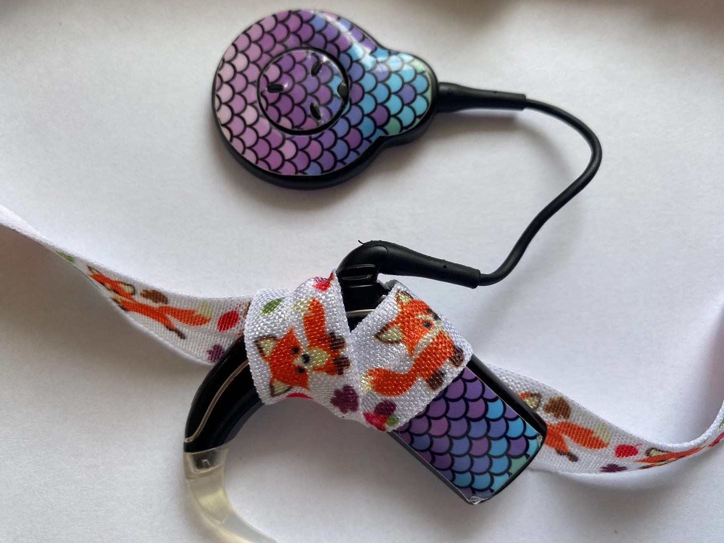 Bandeau ajustable pour implant cochleaire et prothese auditive motif renard