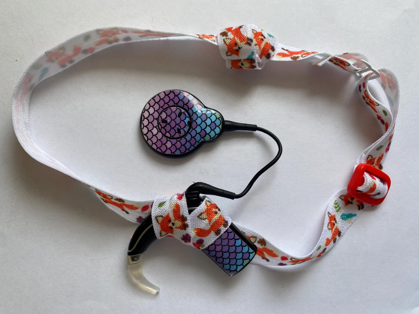 Bandeau ajustable pour implant cochleaire et prothese auditive motif renard