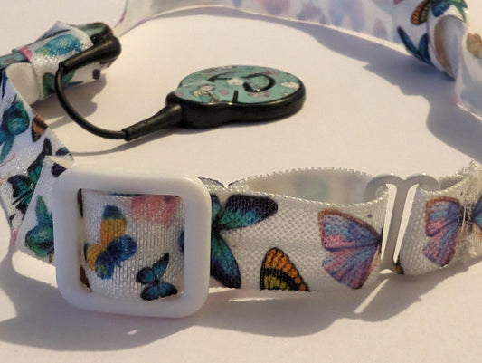 Bandeau ajustable pour implant cochleaire et aide auditive motif papillon